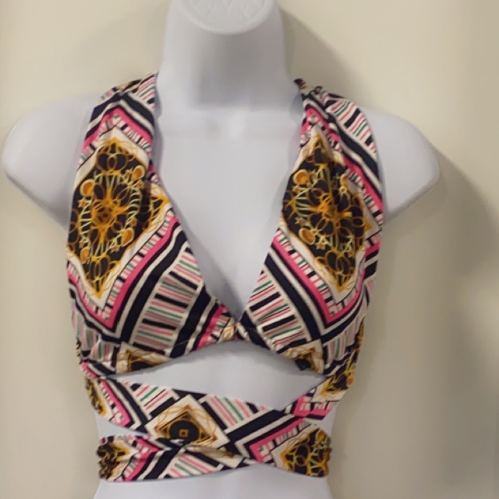 This is a two piece wrap around top with adjustable one size maxi skirt